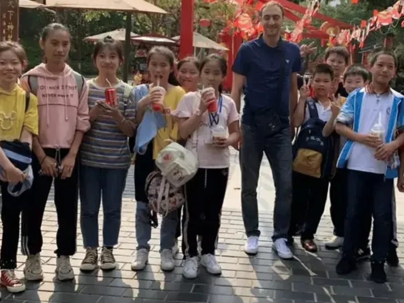 James on a school trip with a group of young students