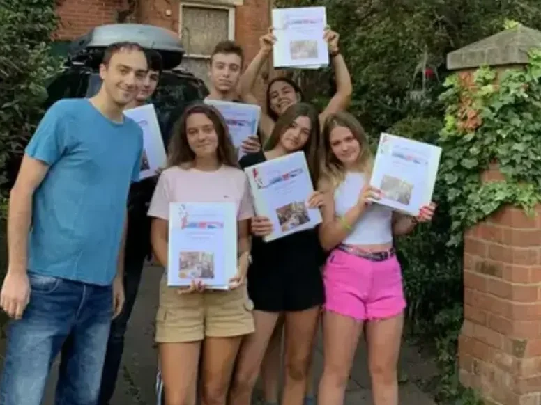 James with a group of students holding their course certificates